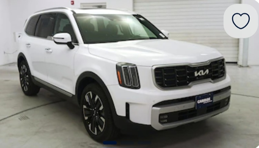 White Kia SUV
